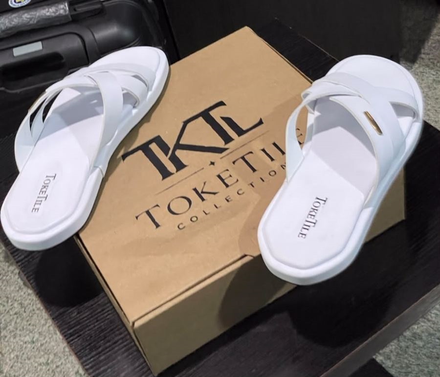 TokeTile Nuff-Tuch cross-strap slide sandals with branded box